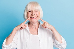 a dental implant patient smiling